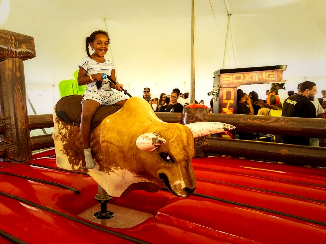 Mechanical bull at the Pure Church Fall Festival