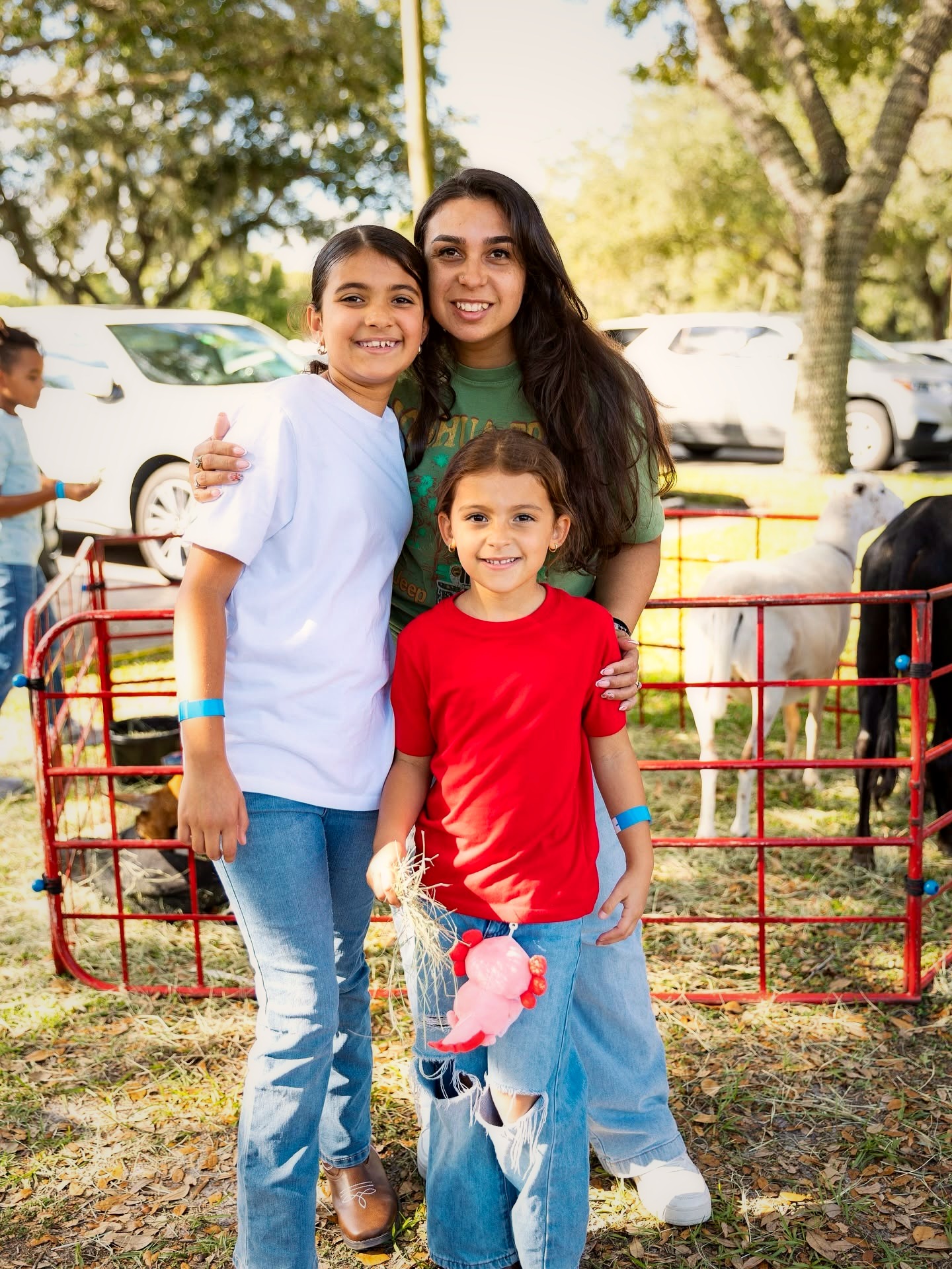 Families at the petting zoo during the Fall Festival